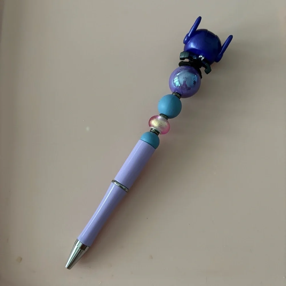 Disney Doorables: Big Hero 6: Hiro Hamada in hero suit handmade beaded pen